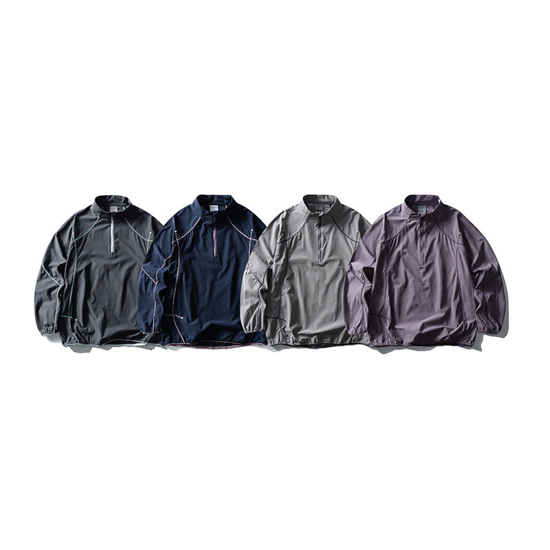 Unisex Lightweight Technical Half-Zip Wind Pullover with Ripstop, Raglan Sleeves and Elastic Hem Chichicherry