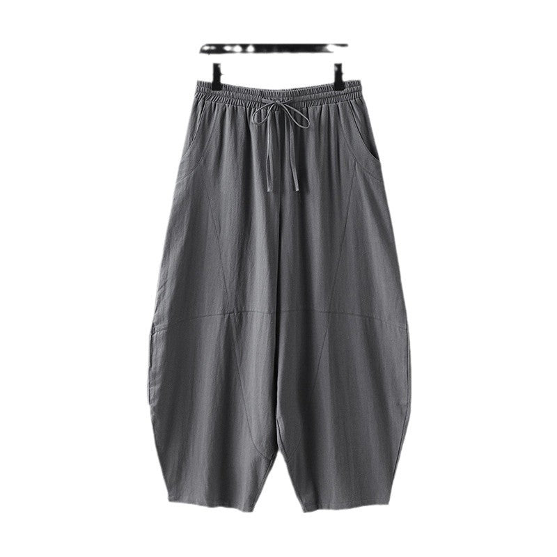 Women's wide harem pants made of lightweight satin with drawstring and side pockets Chichicherry
