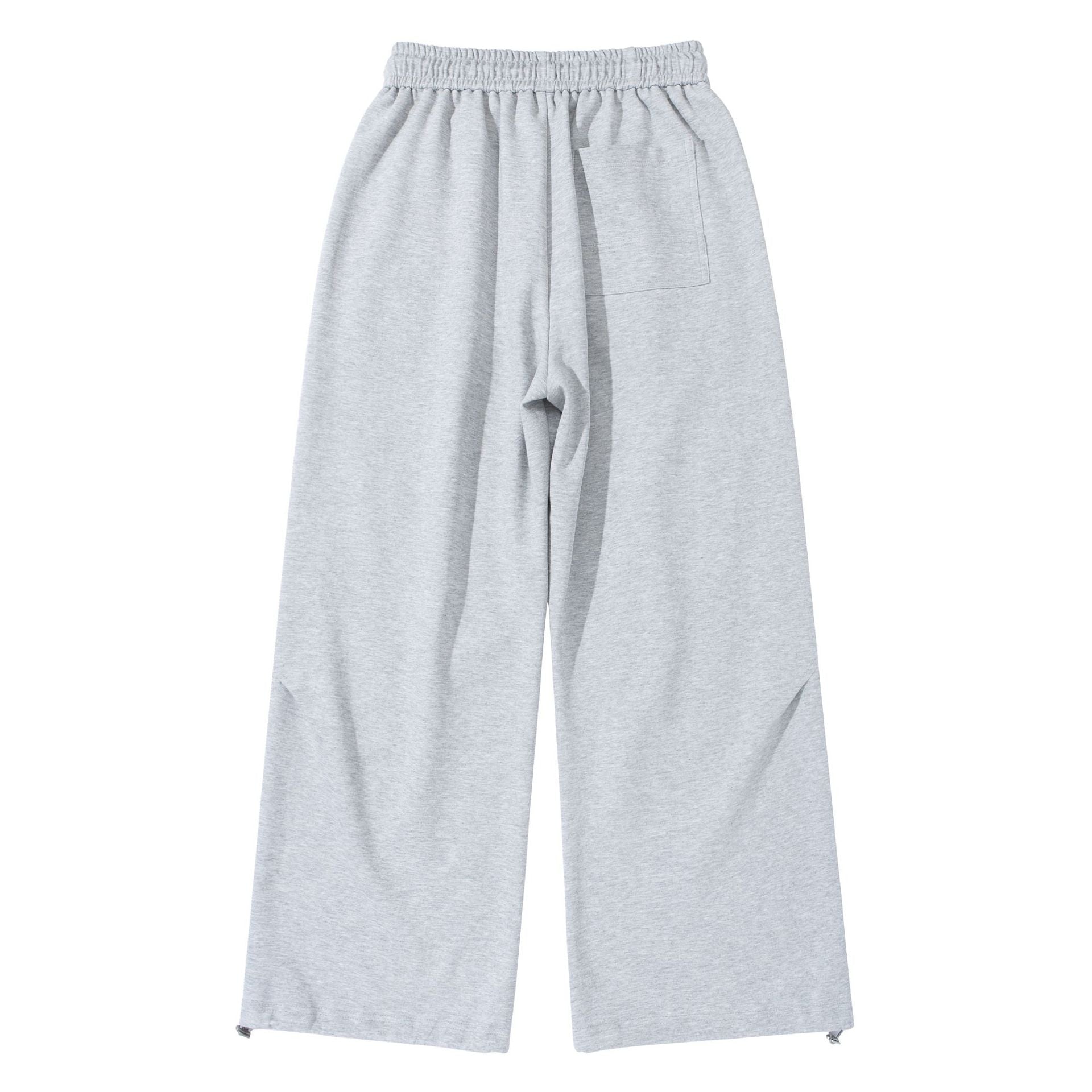 Unisex Wide French-Terry Sweatpants with elastic drawstring waistband, side pockets, and adjustable hem.