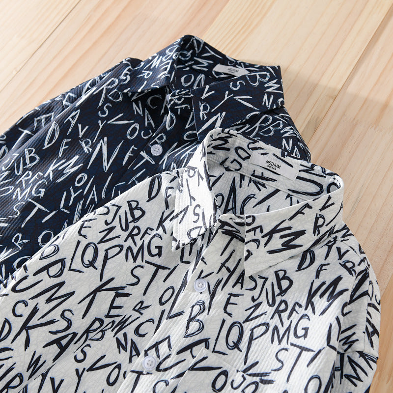 Men's loosely cut long sleeve overshirt with allover letter print and chest pocket Chichicherry