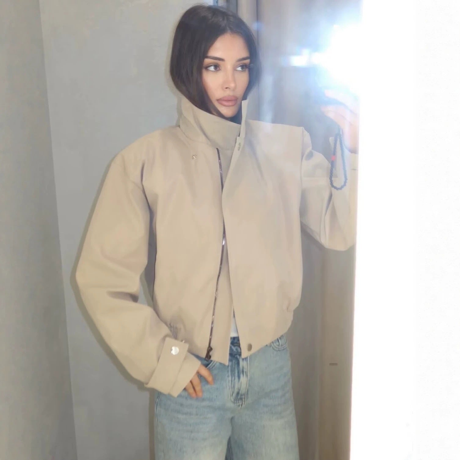 Ladies short jacket with high stand-up collar, elastic waistband and concealed snap button placket Chichicherry