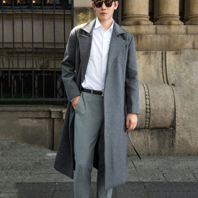 Men's long cut wool coat in minimalist design with generous shawl collar and concealed button placket Chichicherry