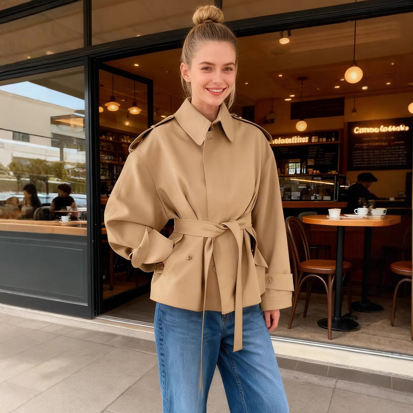 Women's short trench coat with waist belt, shoulder flaps, and patch pockets Chichicherry