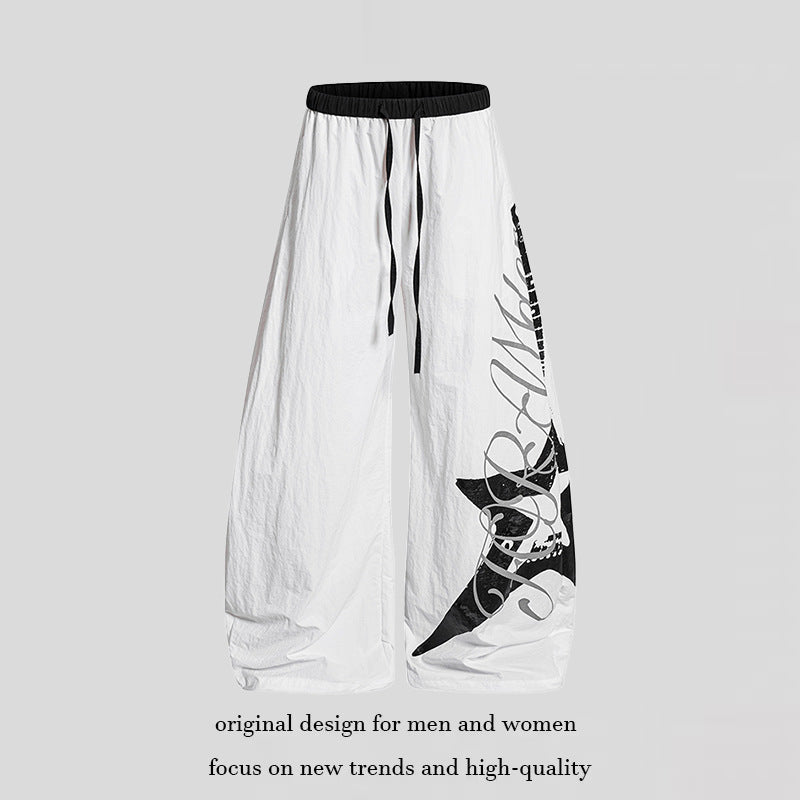 Women's Wide Palazzo Trousers with Drawstring Waist and Large Statement Print Chichicherry