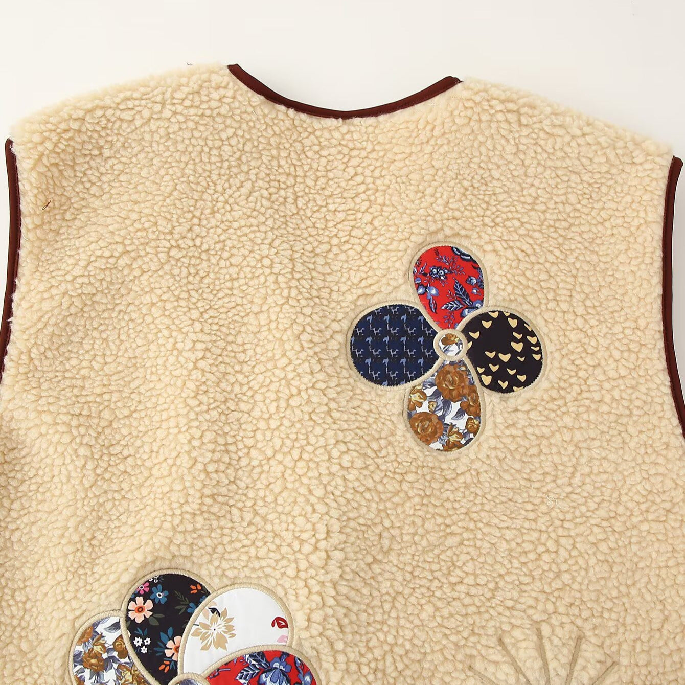 Ladies Padded Teddy Vest with Patchwork Applications and Toggle Closures Chichicherry