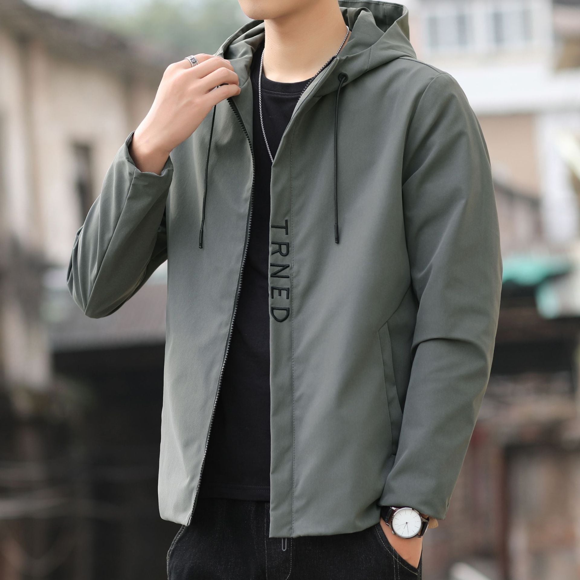 Men's lightweight hooded shell jacket with concealed zipper and minimalist utility look Chichicherry