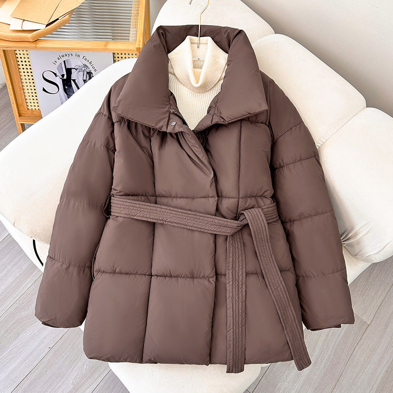 Women's quilted winter jacket with waist belt, stand-up collar, and ribbed cuffs Chichicherry