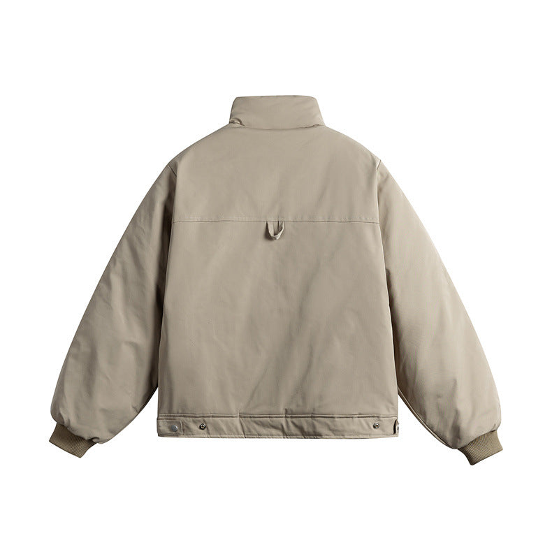 Unisex short cut quilted jacket with stand-up collar and ergonomic side inserts Chichicherry