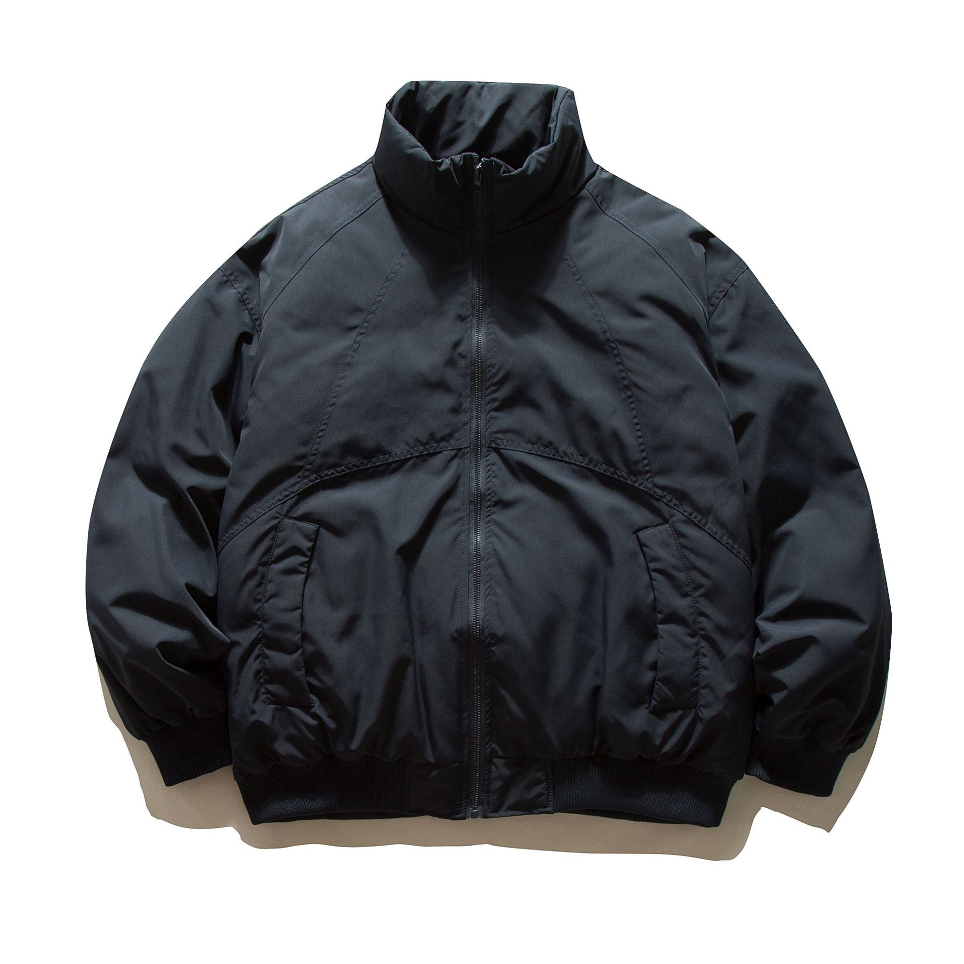 Men's boxy padded bomber jacket with high stand-up collar, elastic hem, and practical side pockets.