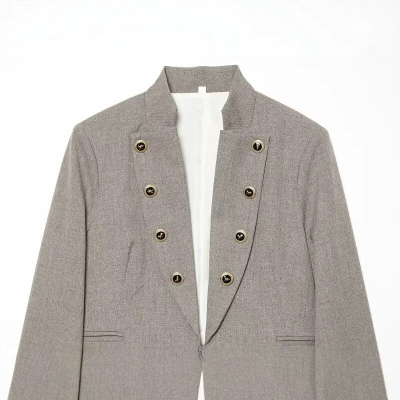 Women Cropped, tailored blazer with stand-up collar, double decorative button placket and asymmetrical hem Chichicherry