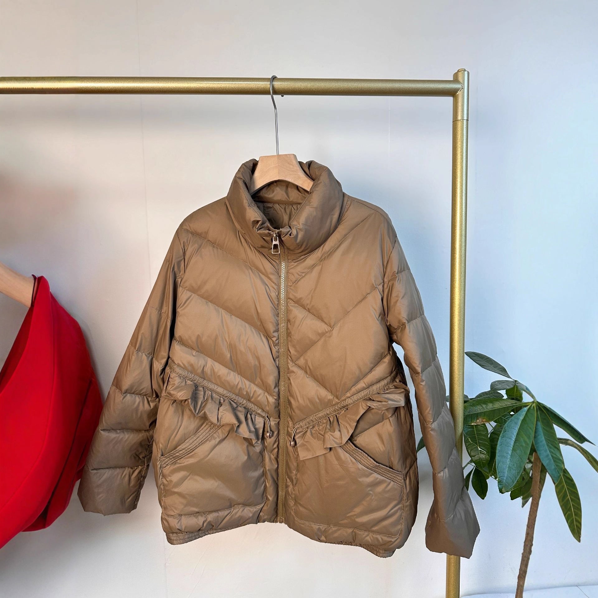 Women's quilted parka with stand-up collar, tailored ruffle detail and thermal insulation Chichicherry