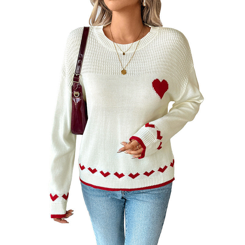 Women's knitted fine knit pullover with heart intarsias, round neckline and ribbed cuffs Chichicherry