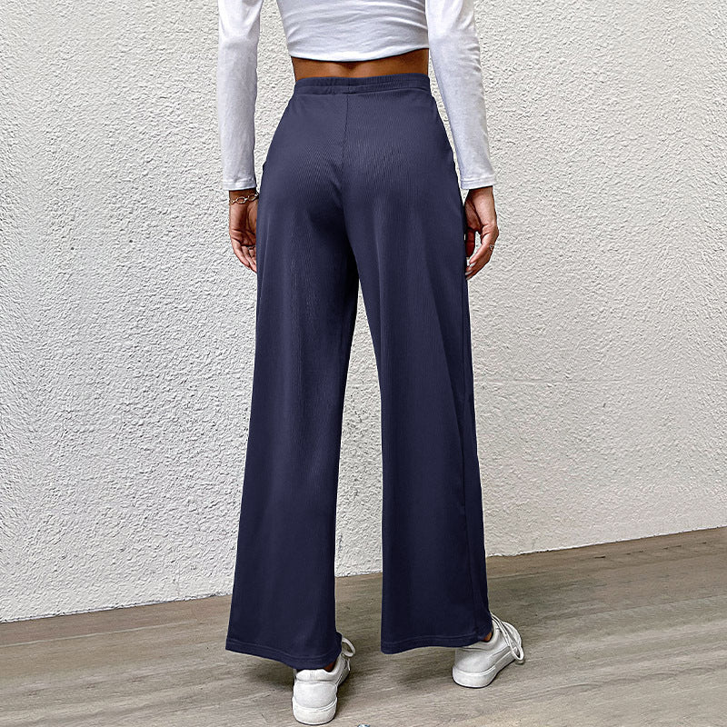 Ladies high-waisted wide trousers with front pleats, elastic waistband and side pockets Chichicherry