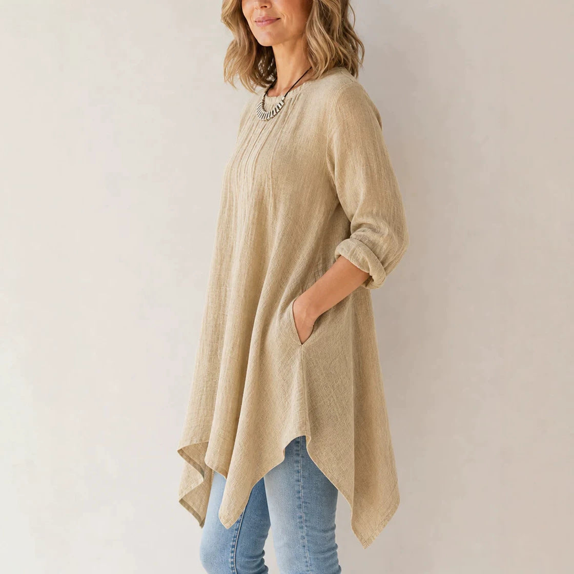 Women's Casual Tunic Blouse with Asymmetrical Hem, Fine Waffle Structure and Box Pleats