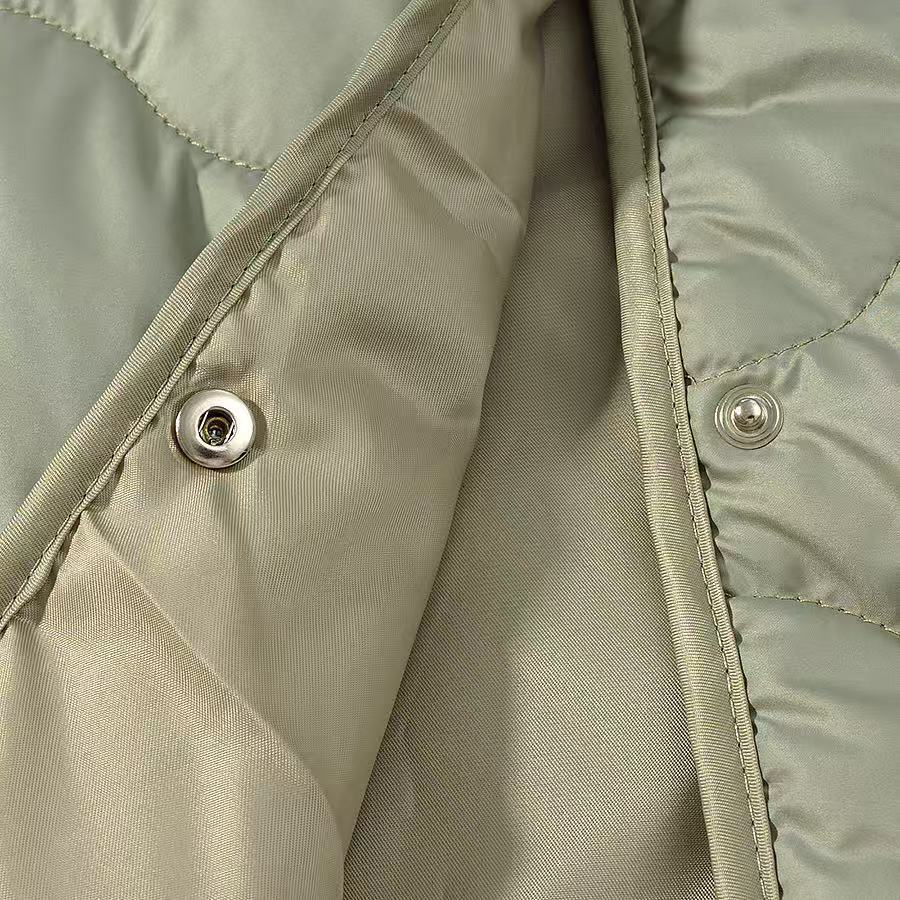 Women's Oversize Quilted Jacket without Collar with Snap Button Closure and Rounded Hem Chichicherry