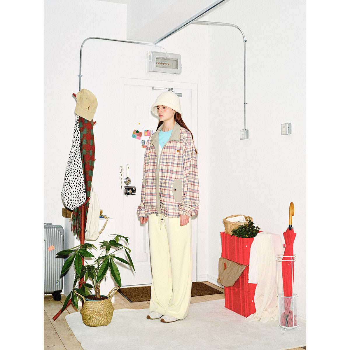 Women's lightly padded checkered boxy bomber jacket with drawstring hem, wooden bead cord and patch pockets Chichicherry