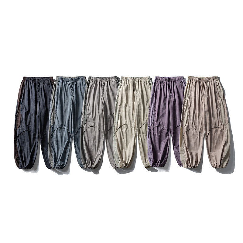 Men's loose technical nylon cargo pants with elastic waistband and panel details Chichicherry