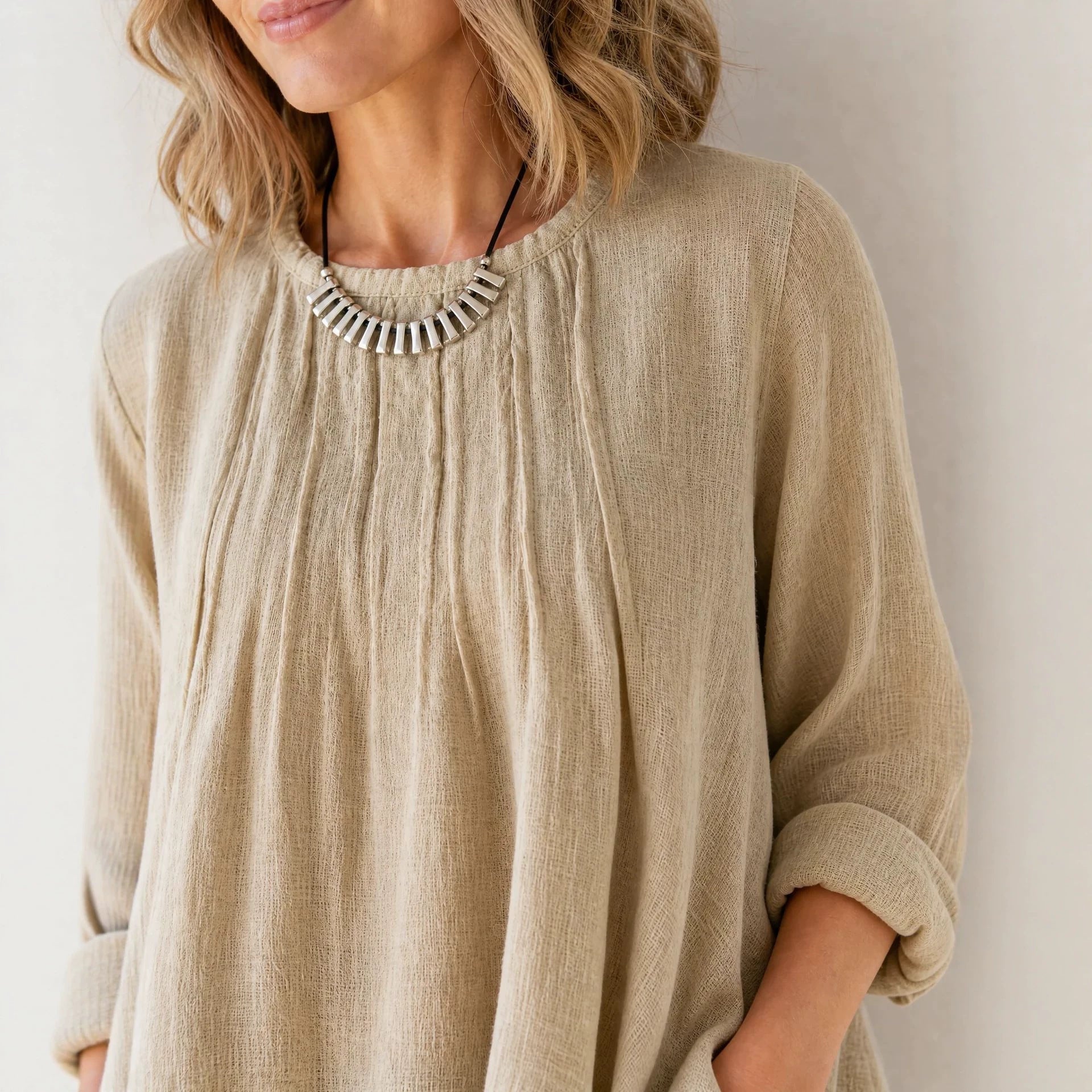 Women's Casual Tunic Blouse with Asymmetrical Hem, Fine Waffle Structure and Box Pleats