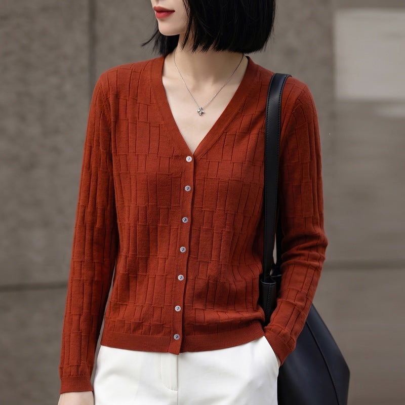 Ladies V-neck fine knit cardigan with structured block design and continuous button placket Chichicherry