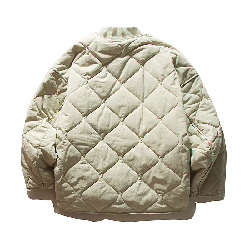 Unisex Lightweight Boxy Puffer Jacket with distinctive diamond quilting, front round pockets, and ribbed collar Chichicherry