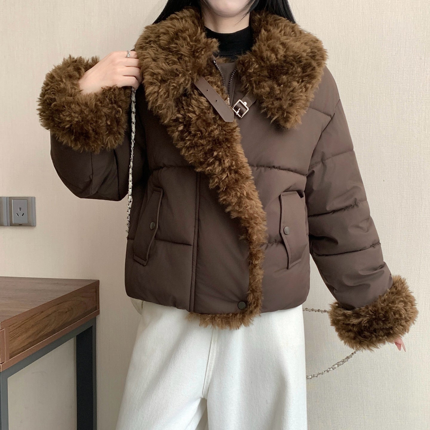 Women's short tailored puffer jacket with voluminous faux fur collar, buckle and zipper details Chichicherry