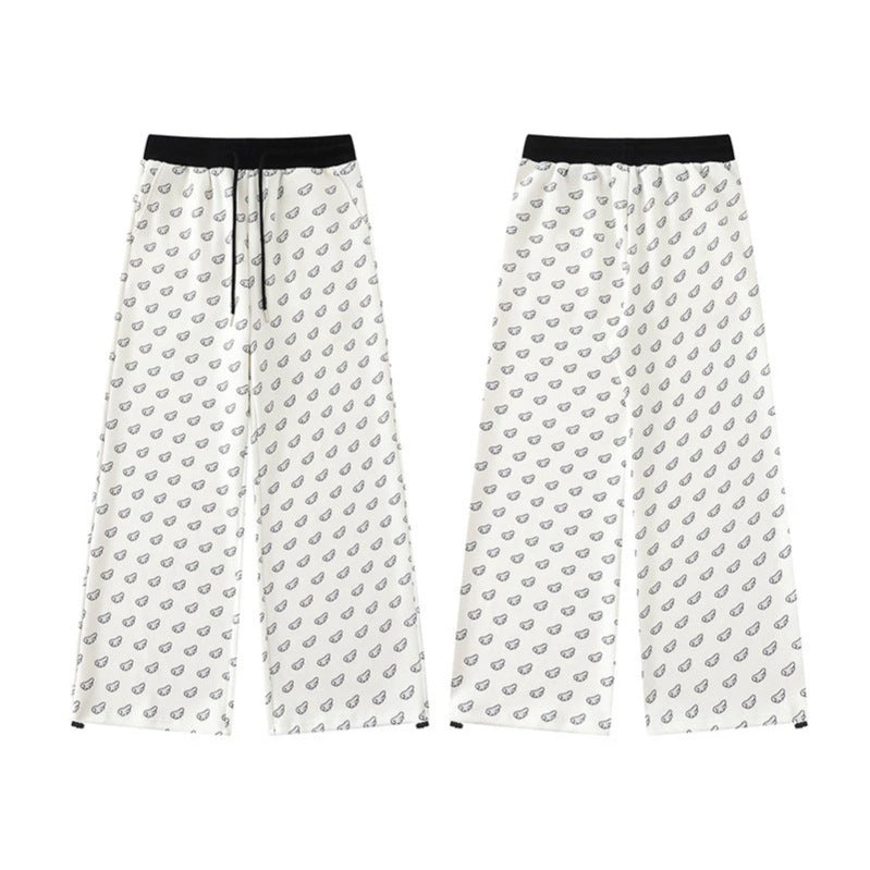 Women's Wide Palazzo Lounge Pants with Elastic Comfort Waistband, Drawstring and Allover Mini Icon Print Chichicherry