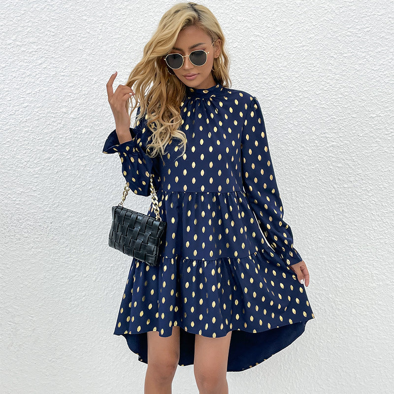 Women's tailored tiered mini dress with stand-up collar, puff sleeves, and metallic dots.