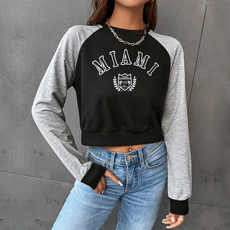 Women Short-Cropped College Sweatshirt with Raglan Sleeves and Elastic Hem Chichicherry