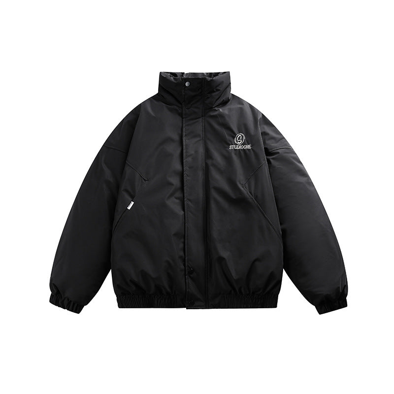 Unisex Boxy padded short jacket with stand-up collar and concealed button placket Chichicherry