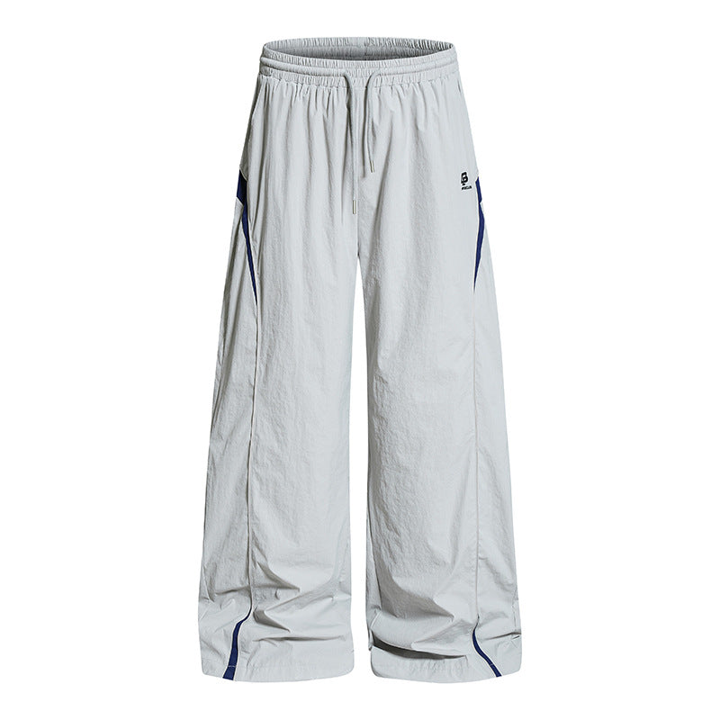 Women Wide Nylon Palazzo Training Pants with Drawstring, Side Contrast Triangles and Adjustable Hem Chichicherry