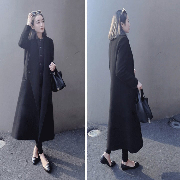 Women's midi-length tailored wool blend long coat with shawl collar, inset pockets, and discreet decorative buttons Chichicherry