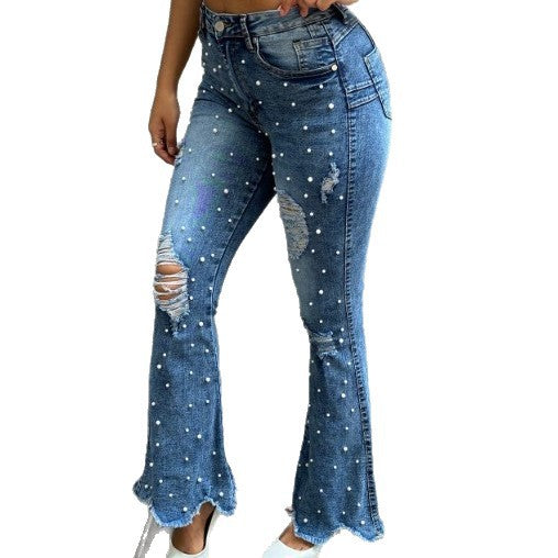Ladies pearl-embellished high-waist flared jeans with destroyed details and raw hem Chichicherry