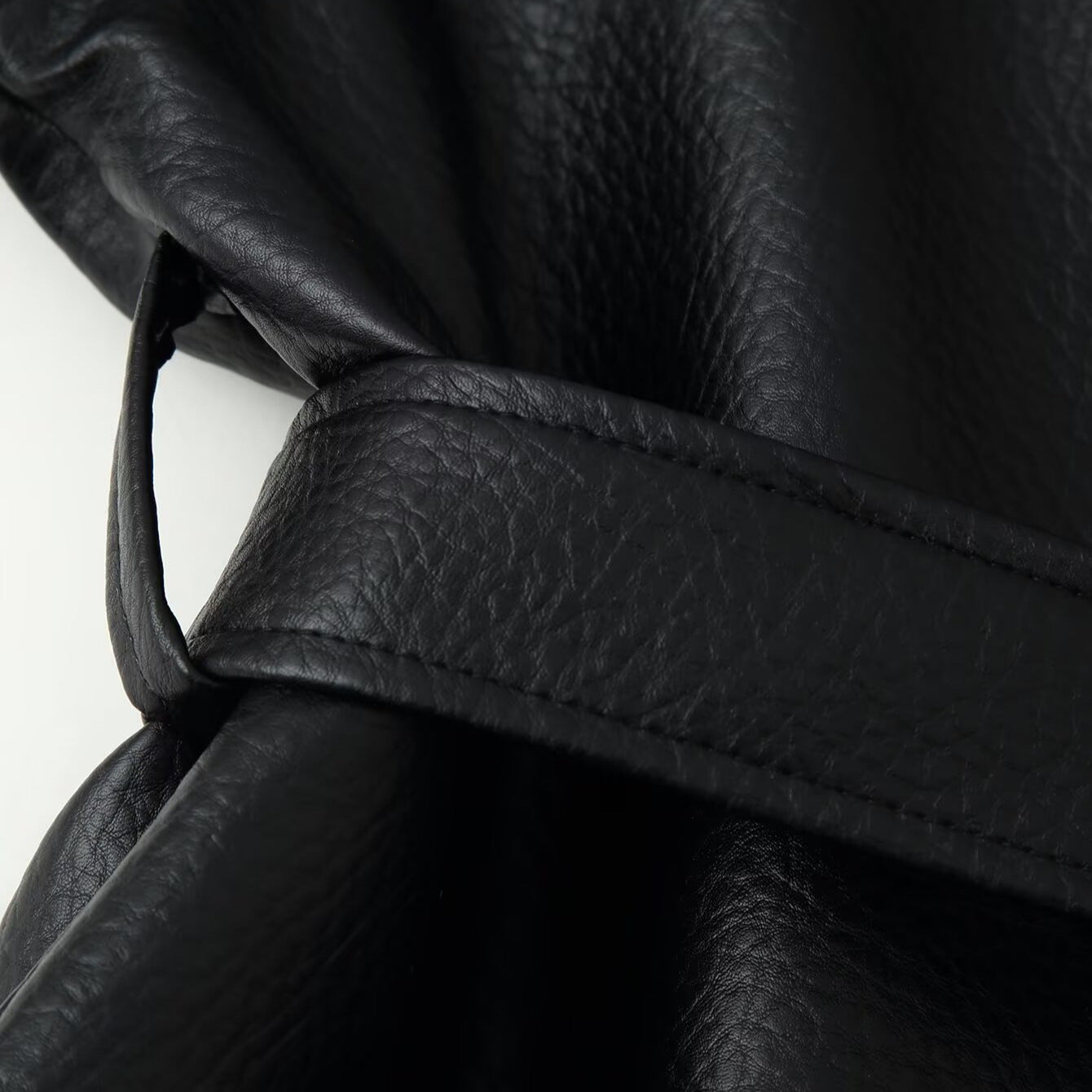 Women's short blazer made of vegan leather with shawl collar and waist tie belt Chichicherry