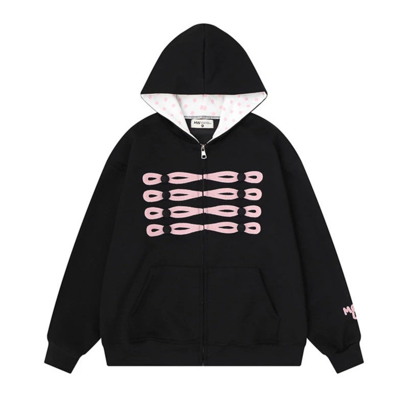 Women's oversized hooded sweatshirt jacket with decorative button print and polka dot hood lining Chichicherry