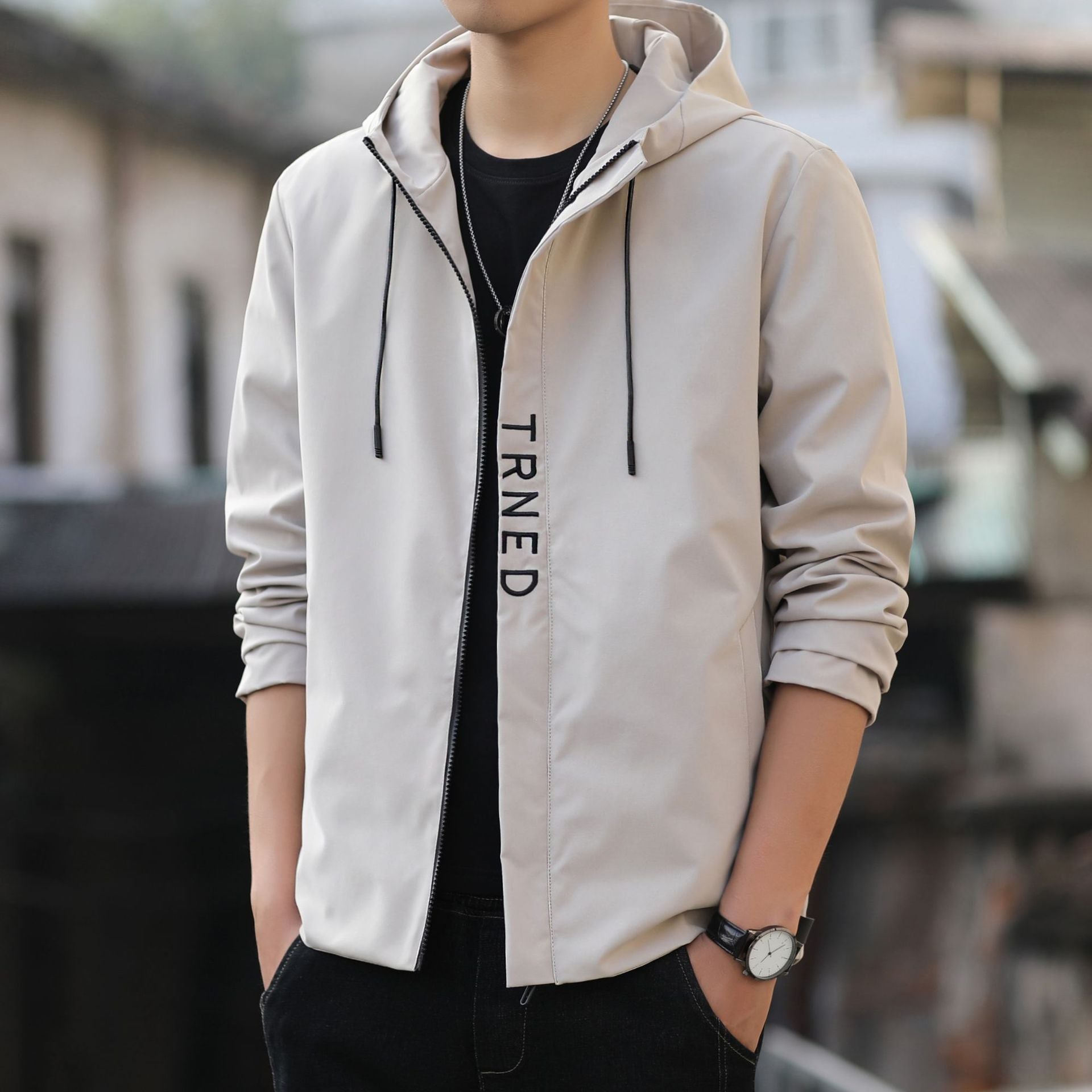 Men's lightweight hooded shell jacket with concealed zipper and minimalist utility look Chichicherry