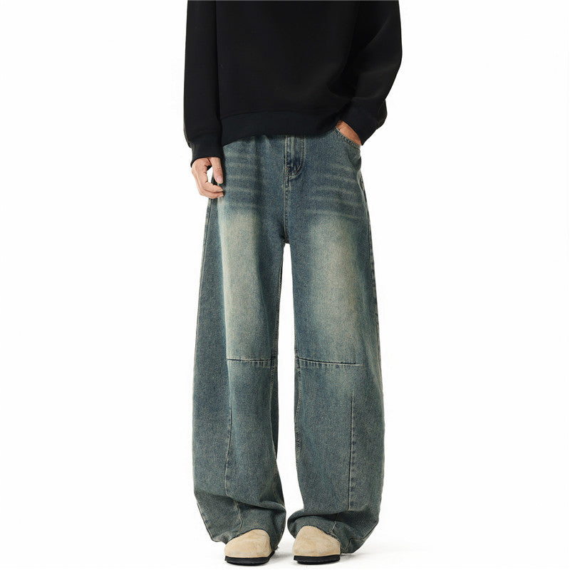 Men's wide-cut baggy jeans with high rise, knee darts, and distressed wash Chichicherry