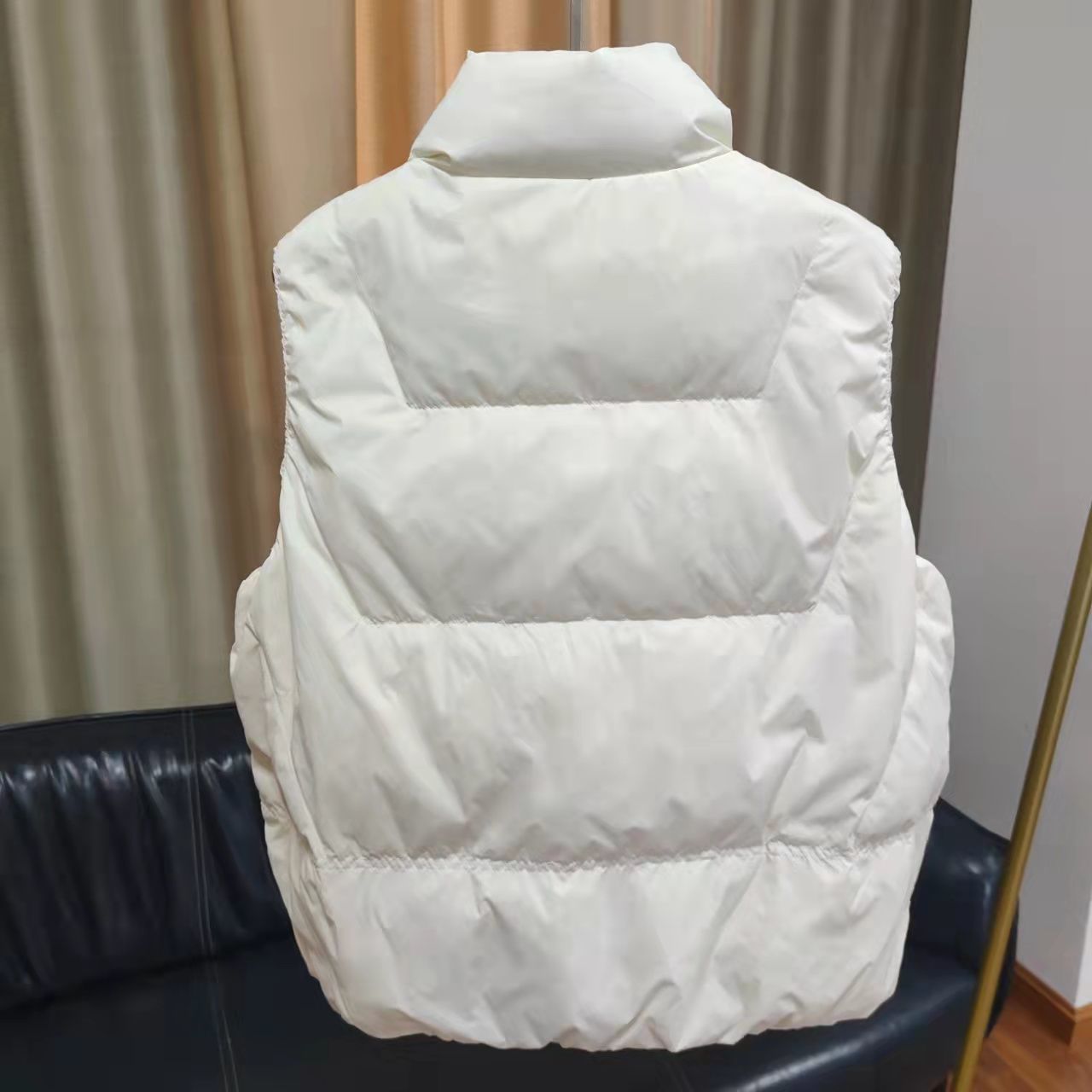 Women's quilted thermal vest with high stand-up collar and patch flap pockets Chichicherry
