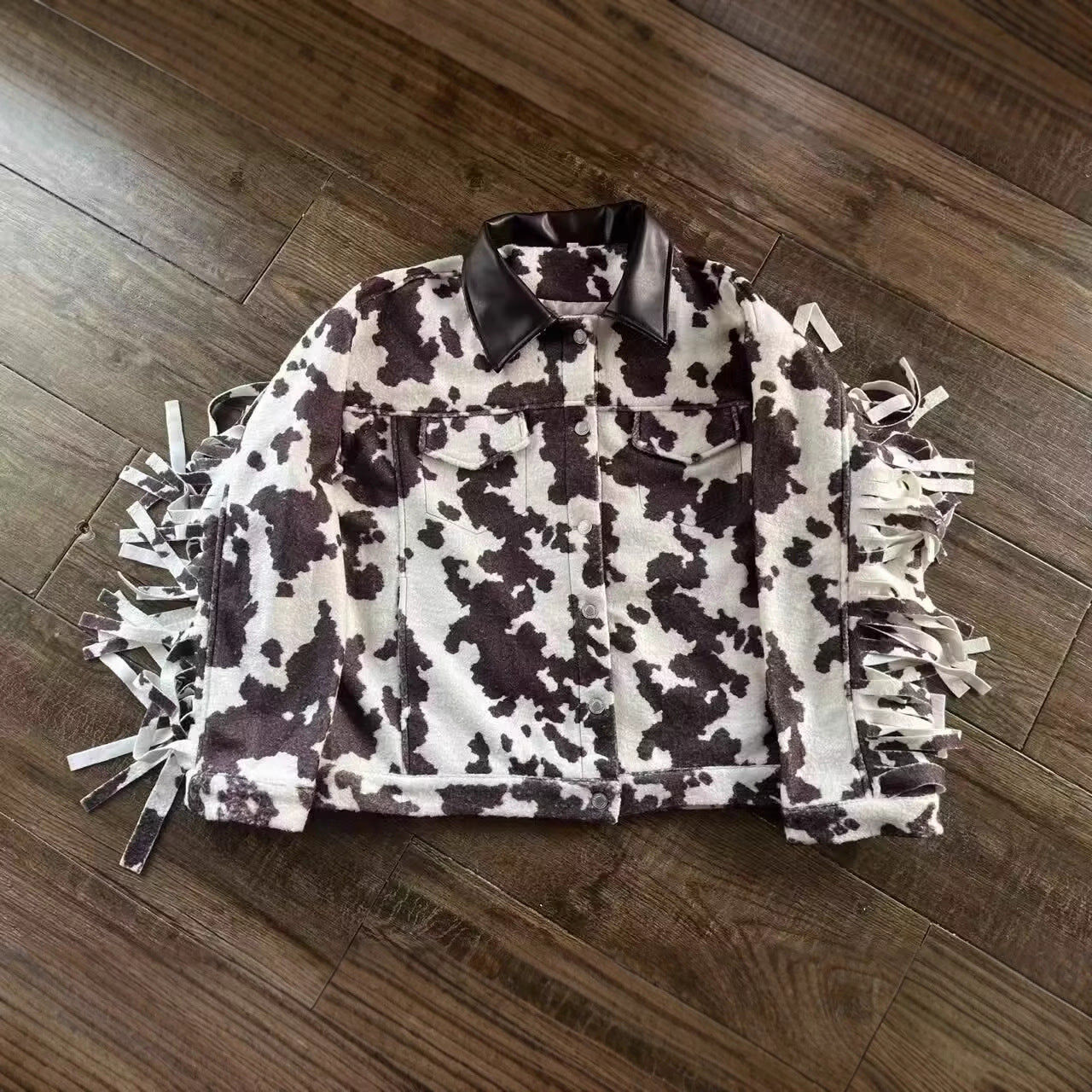 Women’s teddy trucker jacket with cow spot pattern and faux leather collar Chichicherry