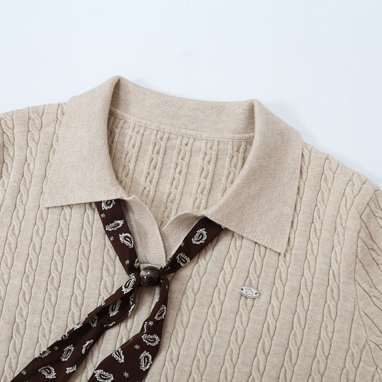 Women's knit sweater with turtleneck and decorative tie Chichicherry