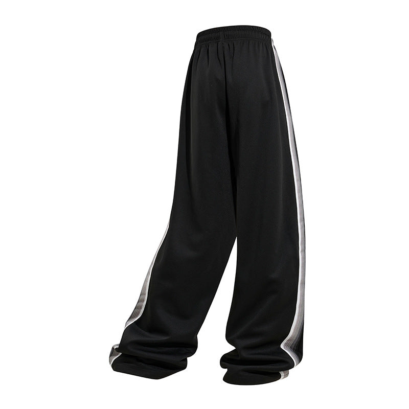 Men's loose baggy training pants with drawstring waistband, elastic comfort waistband, and side stripe detail Chichicherry