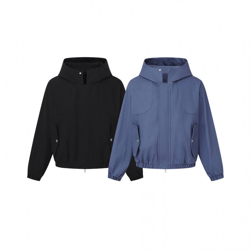 Ladies short cut hooded blouson jacket with textured fabric, patch pockets, and elastic hem Chichicherry