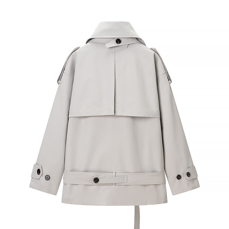 Women's short trench-style jacket with high standing collar, double-breasted front and waist belt Chichicherry