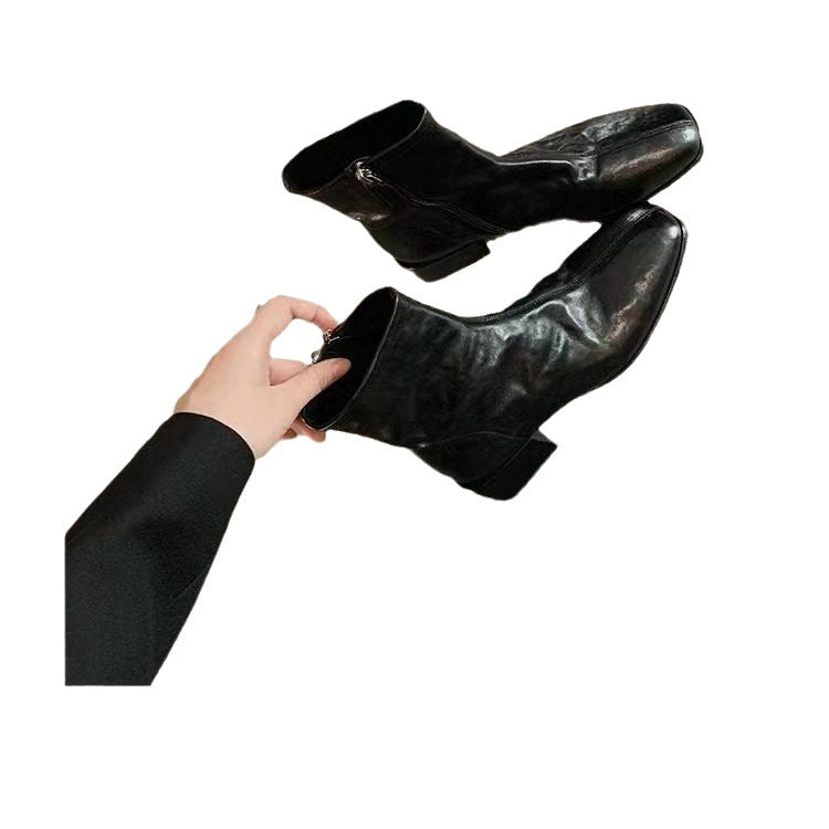 Women's smooth leather ankle boots with a slim sock fit, concealed zipper, and sculpted block heel Chichicherry