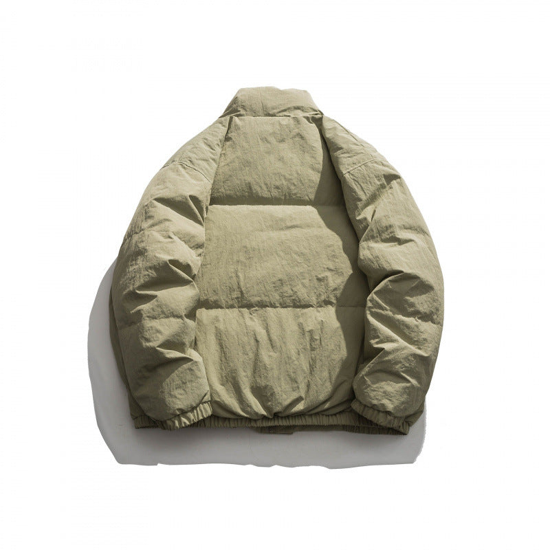 Unisex Oversized padded quilted jacket with high stand collar, large flap pockets and crinkle effect Chichicherry