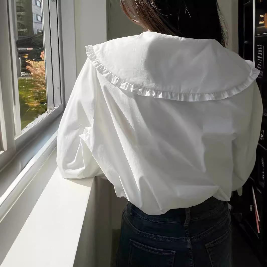 Women's blouse with oversized ruffle collar and finely crafted tailoring Chichicherry