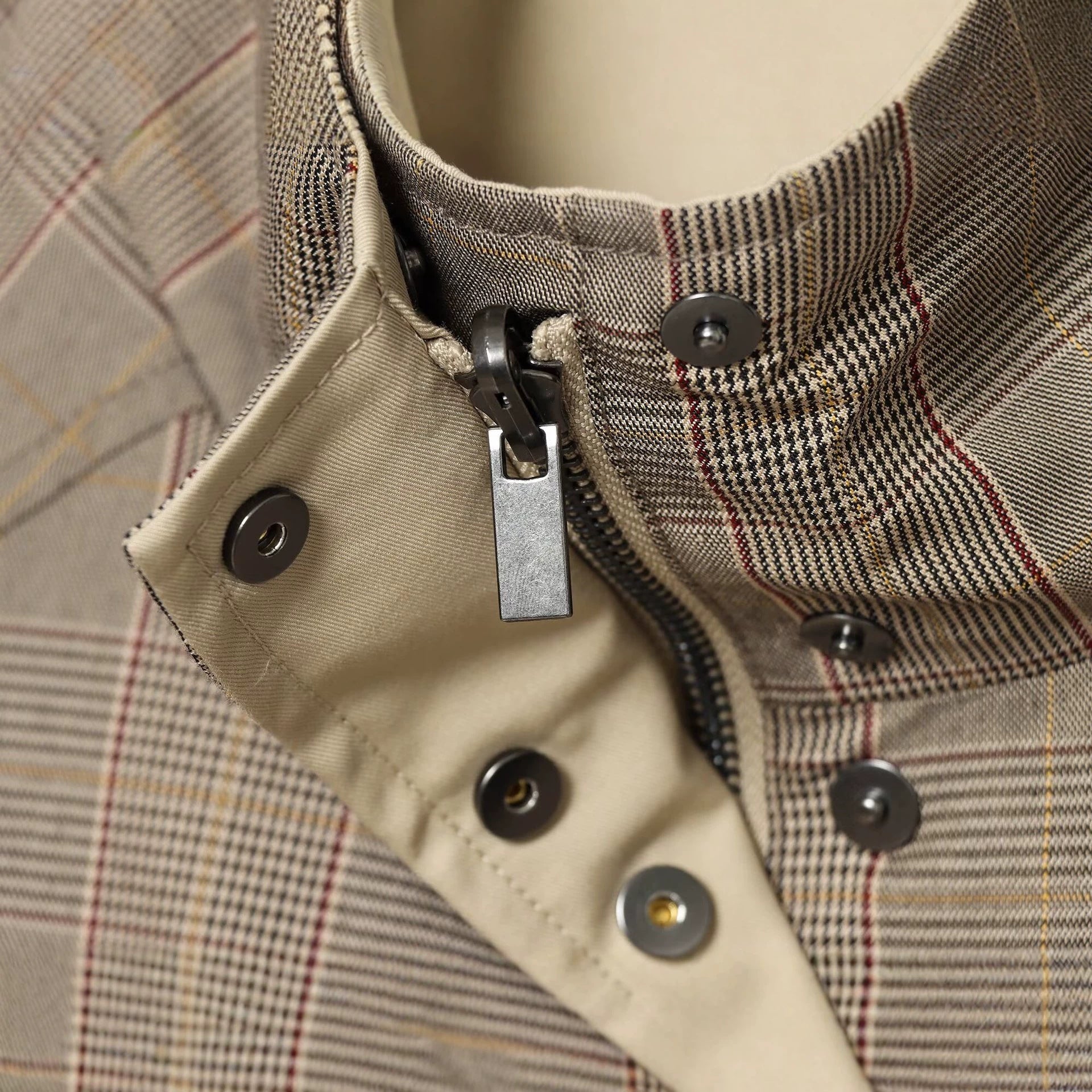 Women's reversible lightweight transitional jacket with stand-up collar, raglan sleeves, and drawstring hem Chichicherry