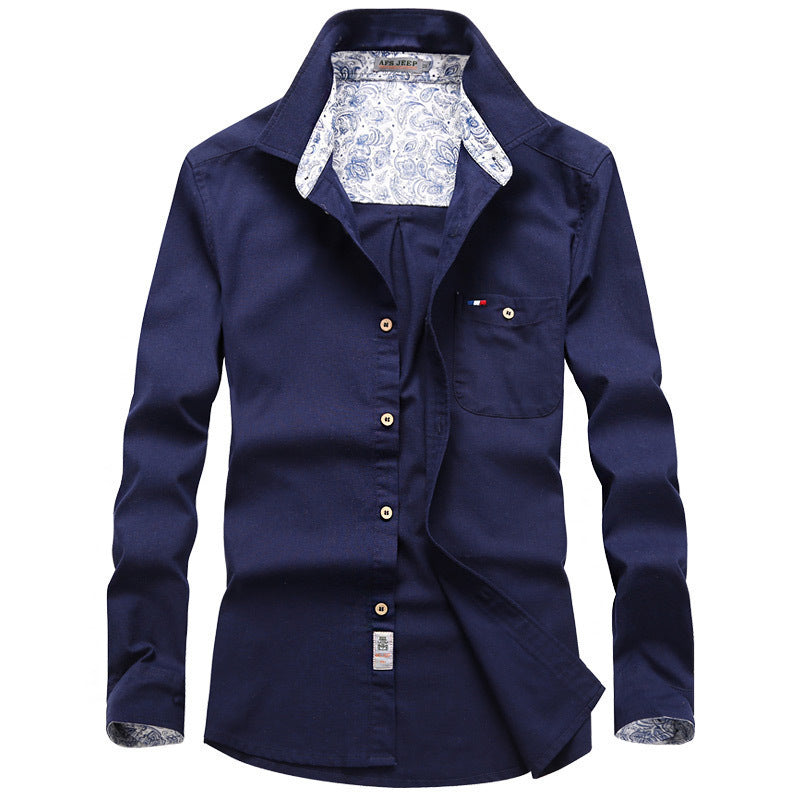 Men's long-sleeve shirt in worker canvas style with chest pocket and patterned collar lining Chichicherry