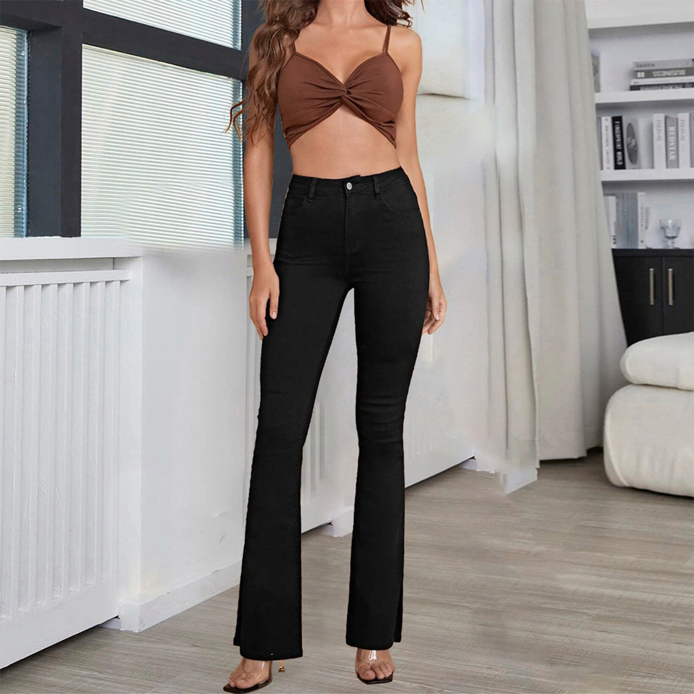 Women’s high-waisted flared trousers made of stretch denim with a center seam and figure-hugging cut Chichicherry