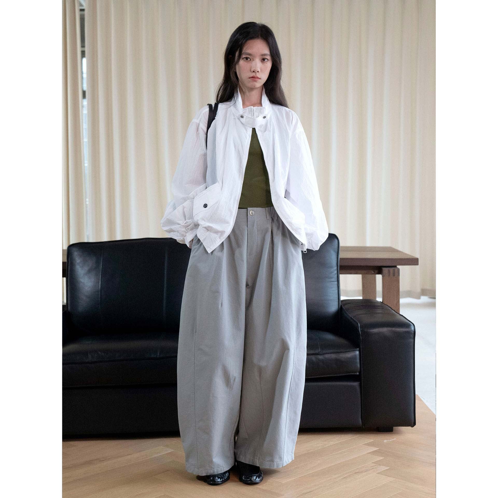 Women's high-waisted wide fabric trousers with concealed elastic waistband and crease Chichicherry