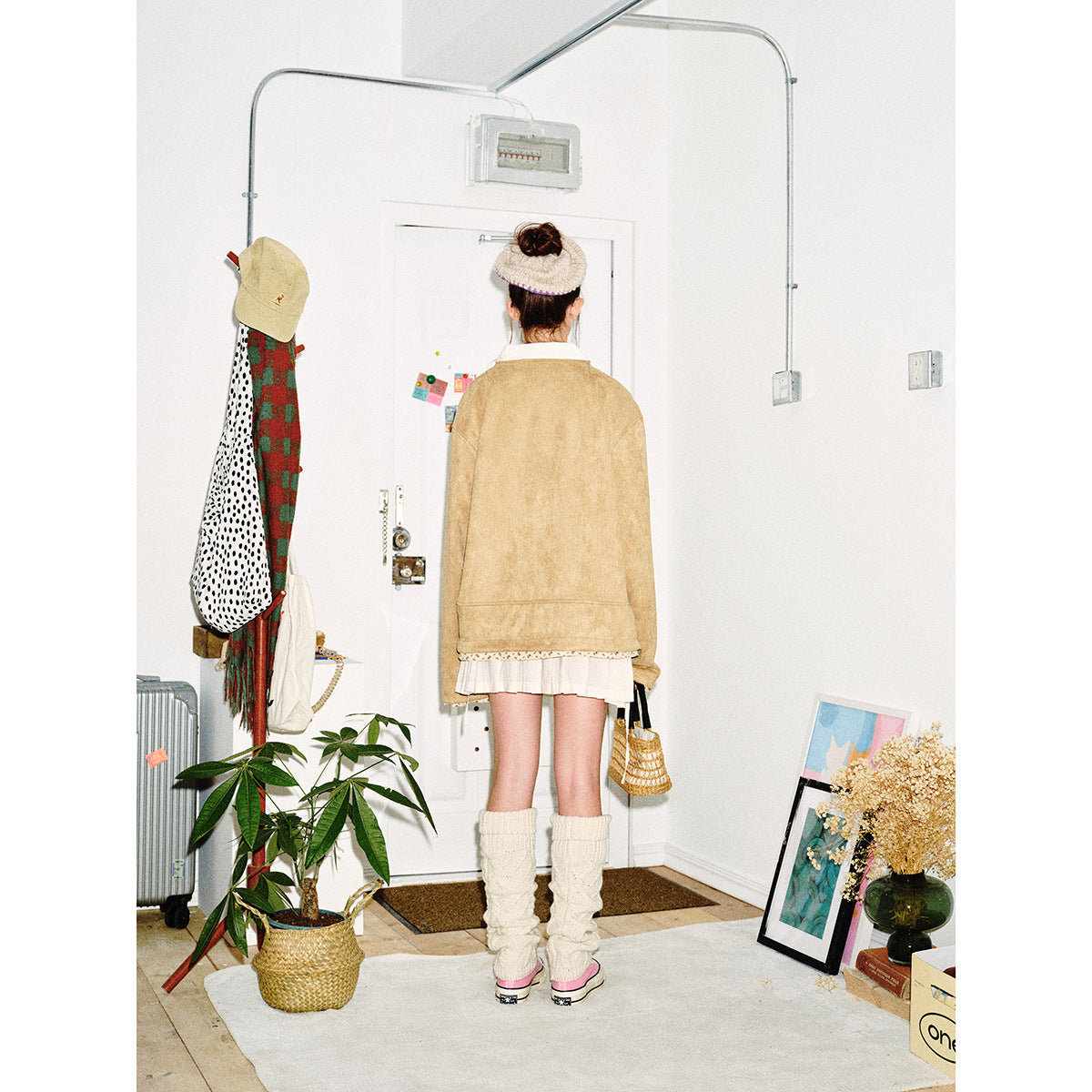 Women's short-cut suede-look blouson jacket with round neck, concealed button placket, and floral inner lining Chichicherry